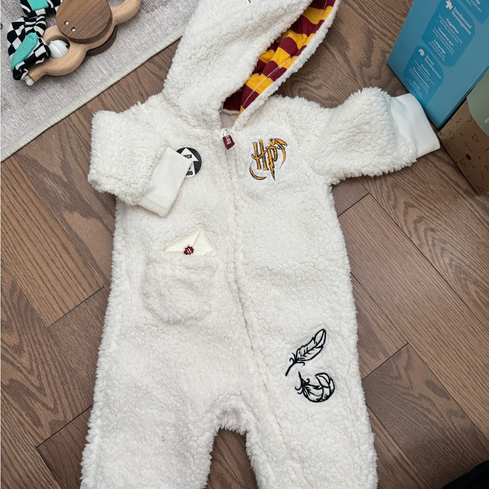 Warner Bros. White Sherpa Hooded Baby One-Piece with Gryffindor Lining